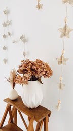 Guirlande d’étoiles en page de vieux livres